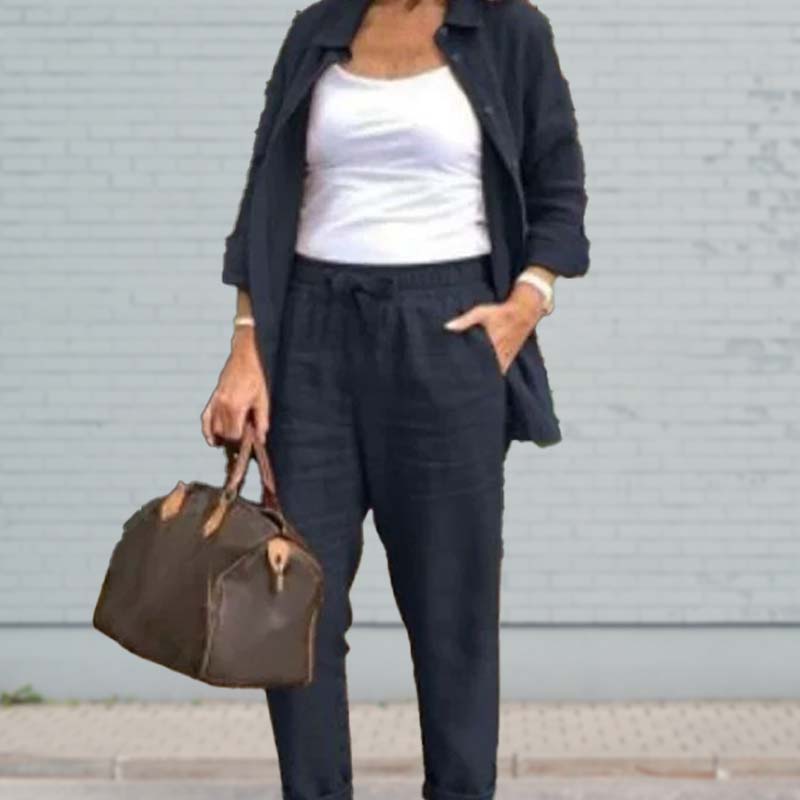 Women's comfortable two-piece lounge set, button-up shirt & drawstring pants for ultimate relaxation.