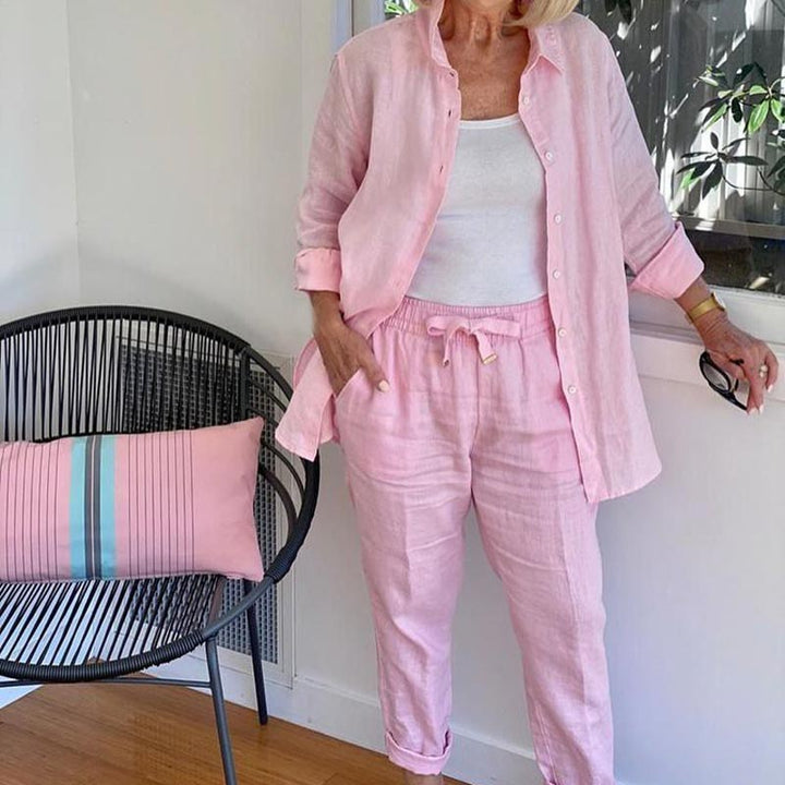 Plus size women's soft lounge set, two-piece comfort with button-up shirt & drawstring pants.