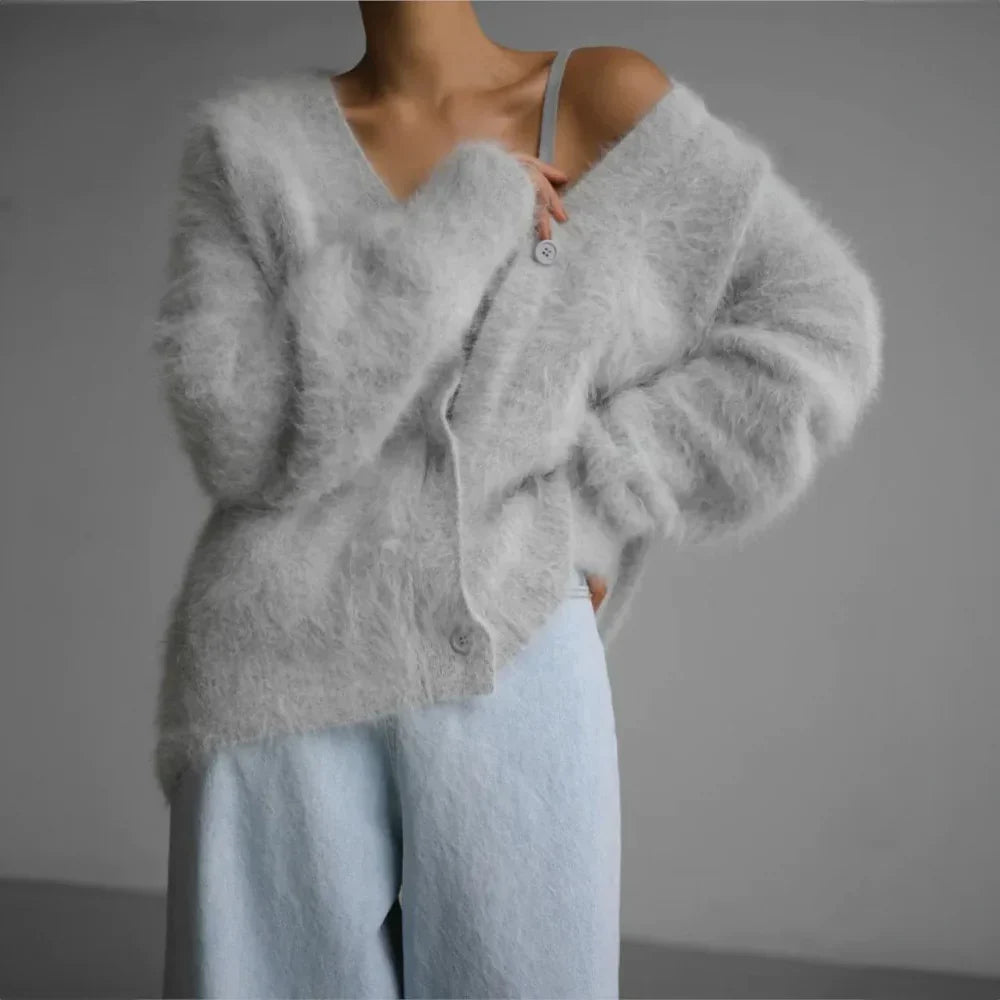 Elegant women's long sleeve open front cardigan. Soft, relaxed fit fabric provides cozy comfort for casual wear.