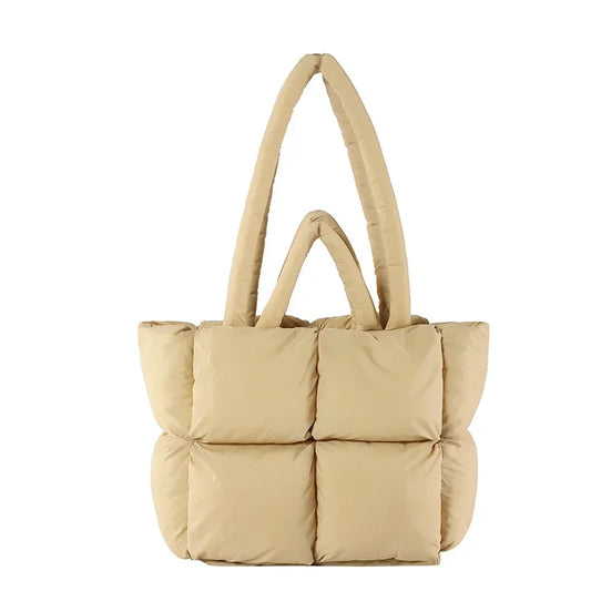 Women's soft padded puffer tote bag, spacious & stylish. A versatile everyday shoulder handbag accessory.
