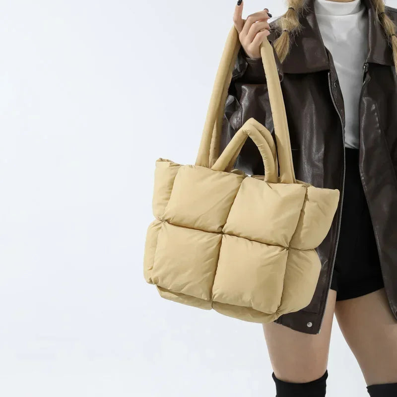 Trendy women's puffer tote bag, soft padded design. Spacious & stylish shoulder handbag for women.