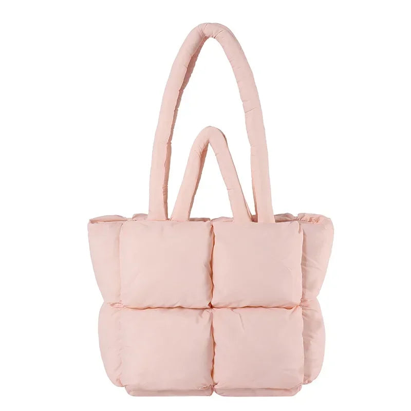 Stylish women's padded puffer tote bag, spacious everyday shoulder bag. A comfortable fashion accessory.