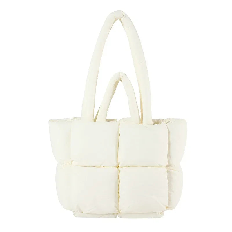 Large women's padded travel tote bag, soft puffer material. Ideal spacious carry-on shoulder handbag.