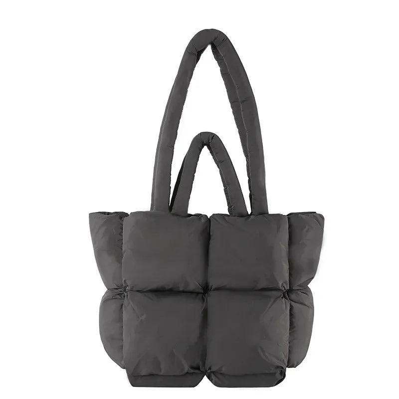 Spacious women's padded tote bag, large capacity for essentials. A soft puffer shoulder handbag.
