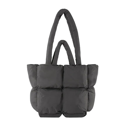 Spacious women's padded tote bag, large capacity for essentials. A soft puffer shoulder handbag.