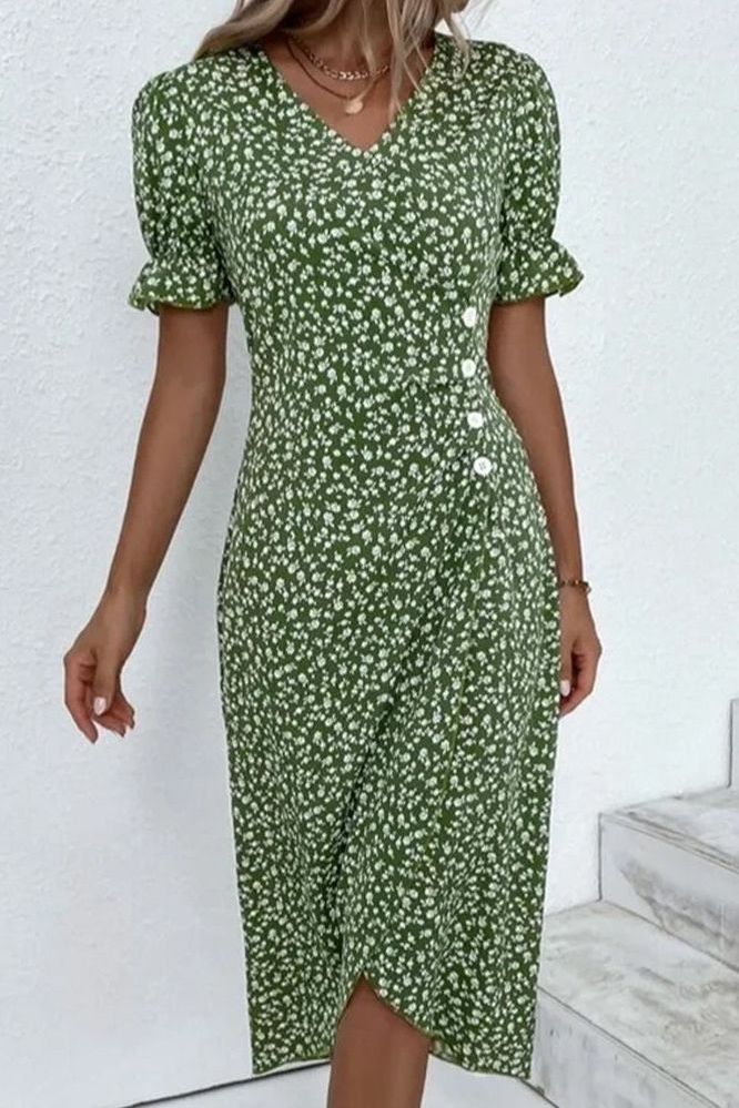 Green women's soft pleated midi dress. Flowy & comfortable, a chic choice.