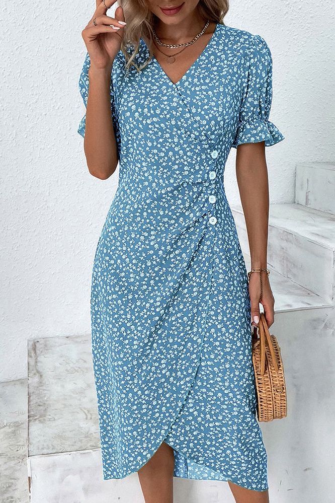Black women's elegant pleated midi dress. Perfect for formal or casual wear.