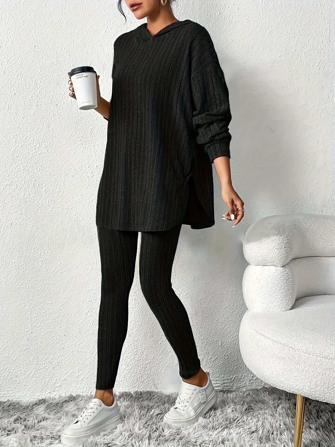 Versatile women's ribbed knit leggings, part of a comfy two-piece lounge set for casual and soft wear.