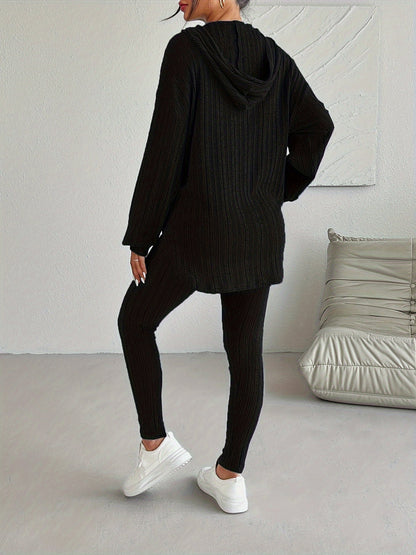 Cozy women's ribbed knit hoodie, a key piece of a comfortable lounge set, great for casual athleisure.