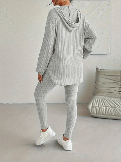 Detail shot of the drawstring on a women's ribbed knit hoodie, part of a comfortable lounge set.