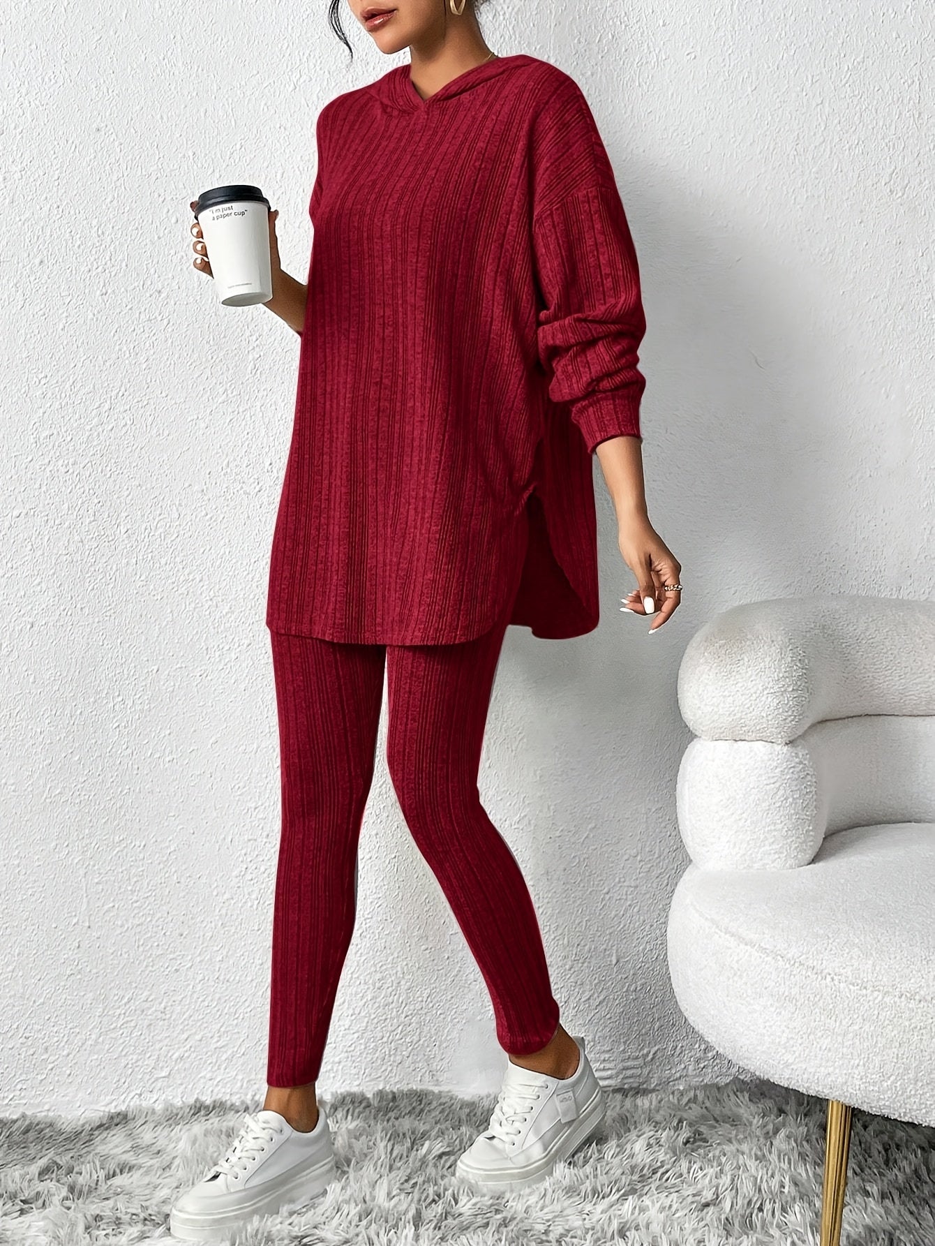 Front view of the women's ribbed knit two-piece lounge set, with a relaxed hoodie and snug leggings.