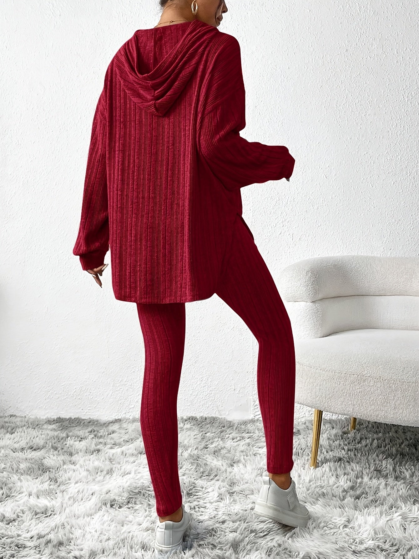 Relaxed women's lounge set with a ribbed knit hoodie, designed for maximum comfort and stylish home wear.