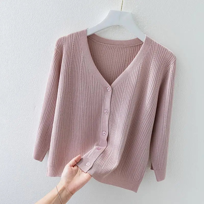Comfortable women's soft ribbed knit v-neck cardigan, button-front design, perfect as a cozy layering sweater.