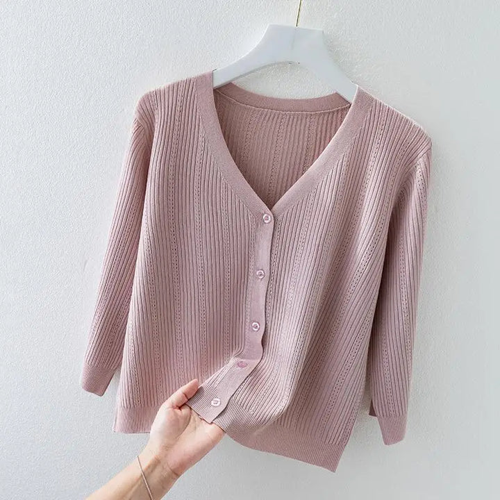 Comfortable women's soft ribbed knit v-neck cardigan, button-front design, perfect as a cozy layering sweater.