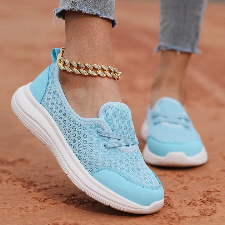 Women's pain relief shoes with soft sole, arch support & posture correction for ultimate walking comfort.
