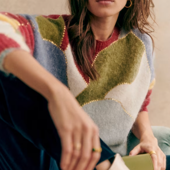 Cozy women's soft textured pullover sweater. Comfortable crewneck long sleeve top, ideal for fall and winter wear.