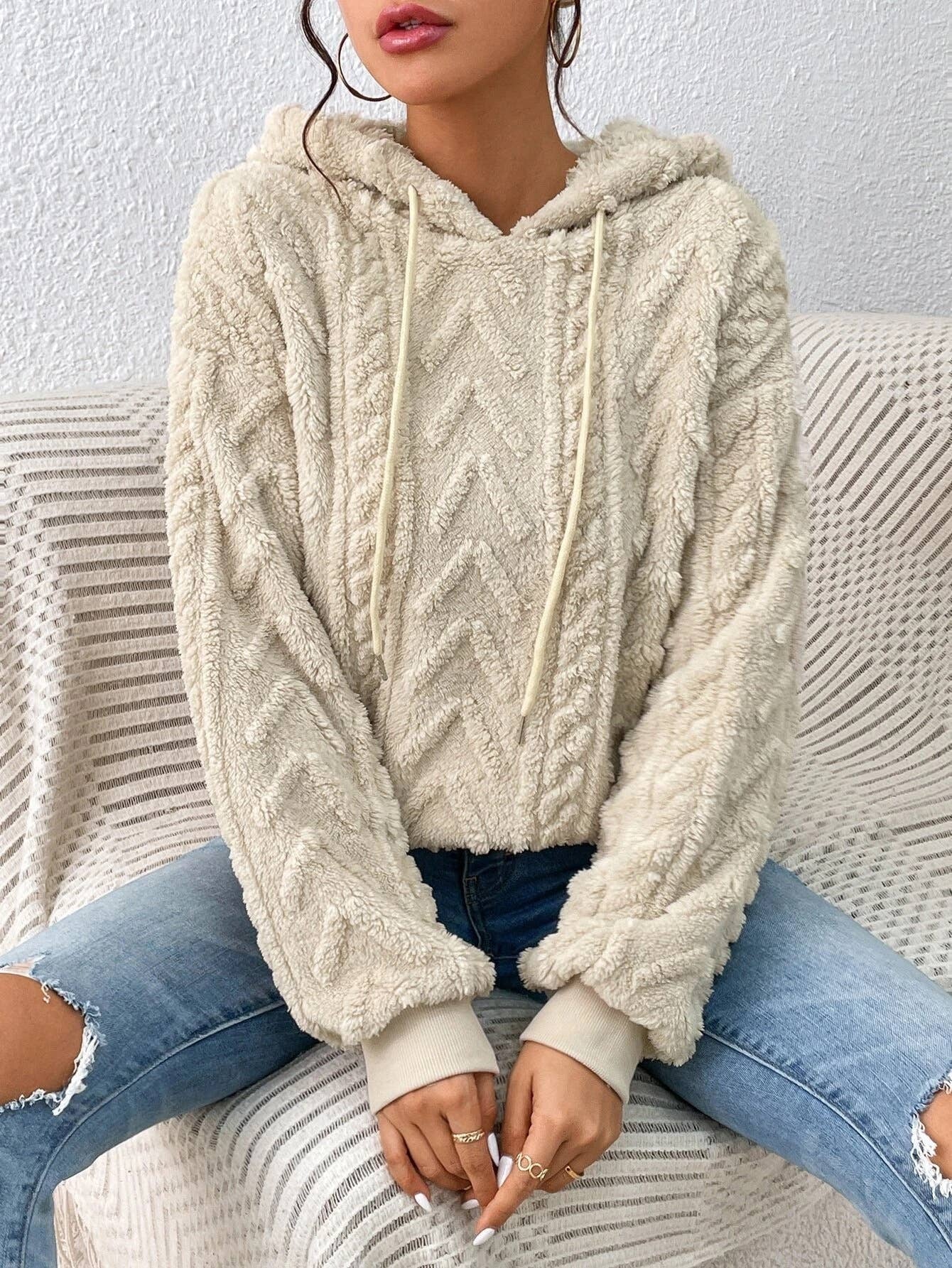 Women's soft & warm cable-inspired pullover sweater. Cozy oversized fit for fall & winter layering.