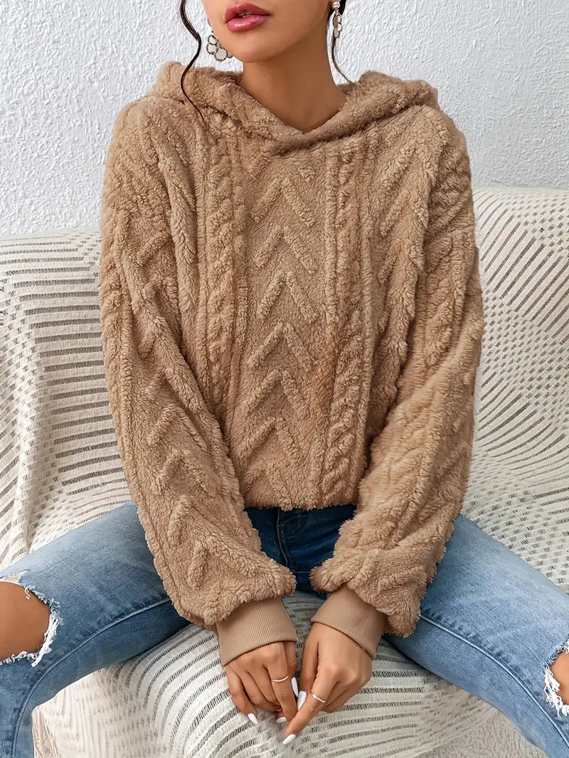 Oversized cable-inspired pullover for women. Soft, warm, and comfortable sweater with a relaxed fit.