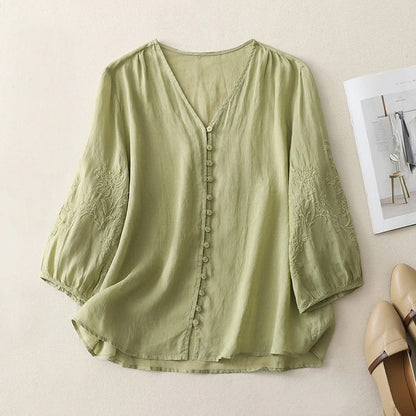 Embroidered Solana blouse with delicate details, a flowy long sleeve top ideal for stylish summer outfits.