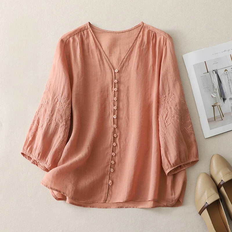 Soft, comfortable women's embroidered flowy blouse with long sleeves, offering chic style and easy wear.
