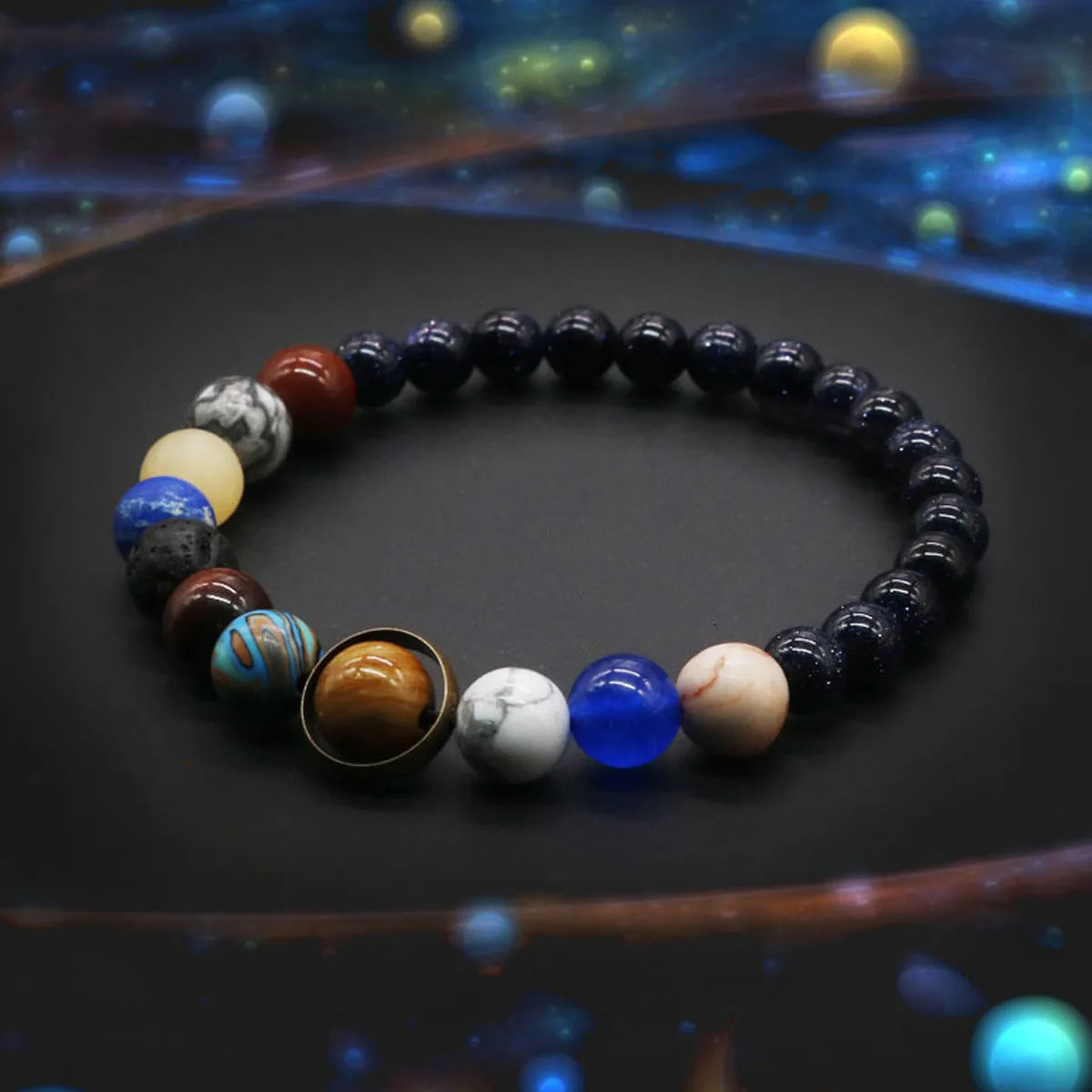 Unique astronomy gift: women's solar system gemstone beaded bracelet with colorful planet designs.