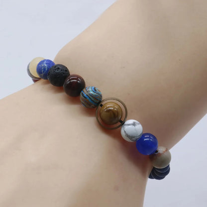Elegant women's solar system bracelet, featuring polished gemstone beads representing planets & space.