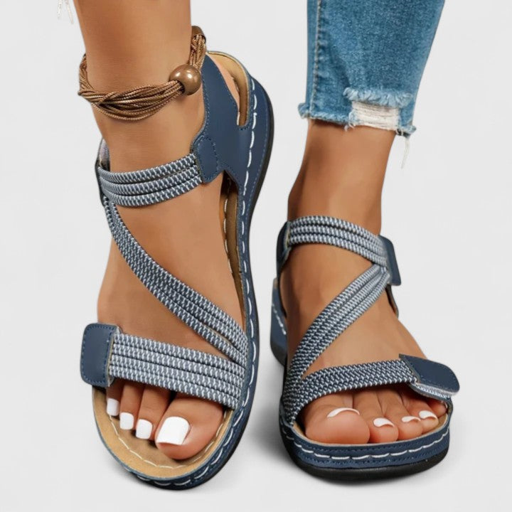 Elegant women's sandals, providing sophisticated style & essential arch support comfort.