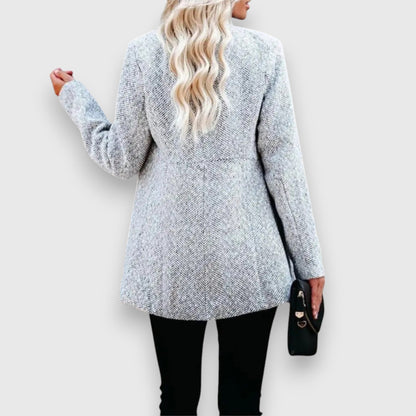 Elegant women's tailored blazer for a polished, professional style; ideal for office wear & business meetings.