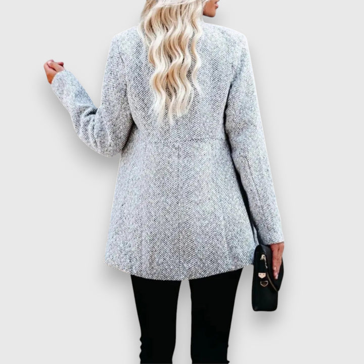 Elegant women's tailored blazer for a polished, professional style; ideal for office wear & business meetings.