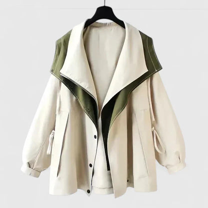 Stay stylish & dry with this women's sophisticated water-repellent jacket. Versatile all-weather outerwear.