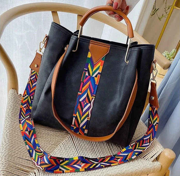 Detailed view of durable PU leather women's tote bag texture. Stylish everyday carry or work accessory.