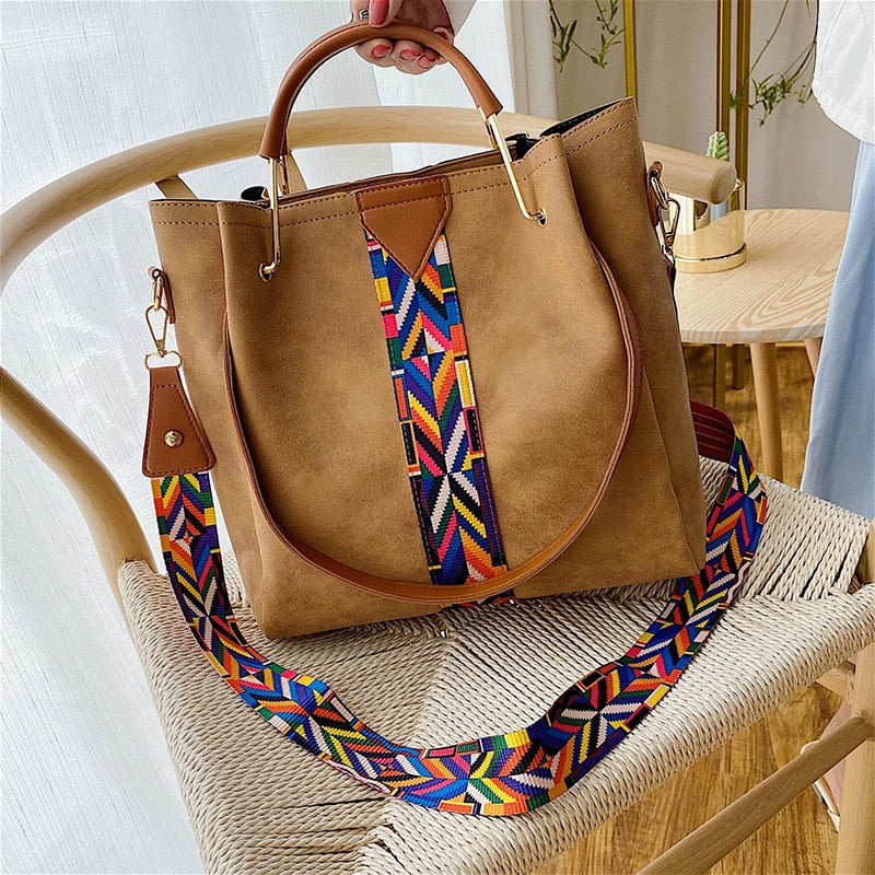 Elegant women's PU leather everyday carry tote. A spacious & stylish shoulder bag for work, travel, & fashion.