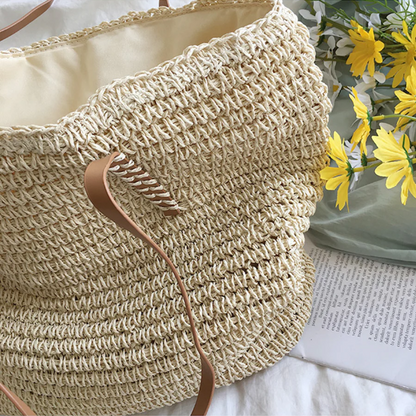 Stylish TerraWoven women's handbag featuring a rich woven texture and sturdy shoulder strap. Spacious & versatile.