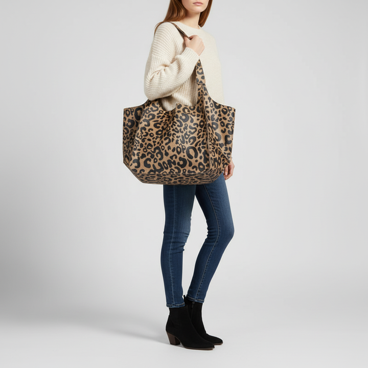 Front view of a sleek, spacious vegan leather tote bag. Ideal women's bag for a minimalist yet functional style.