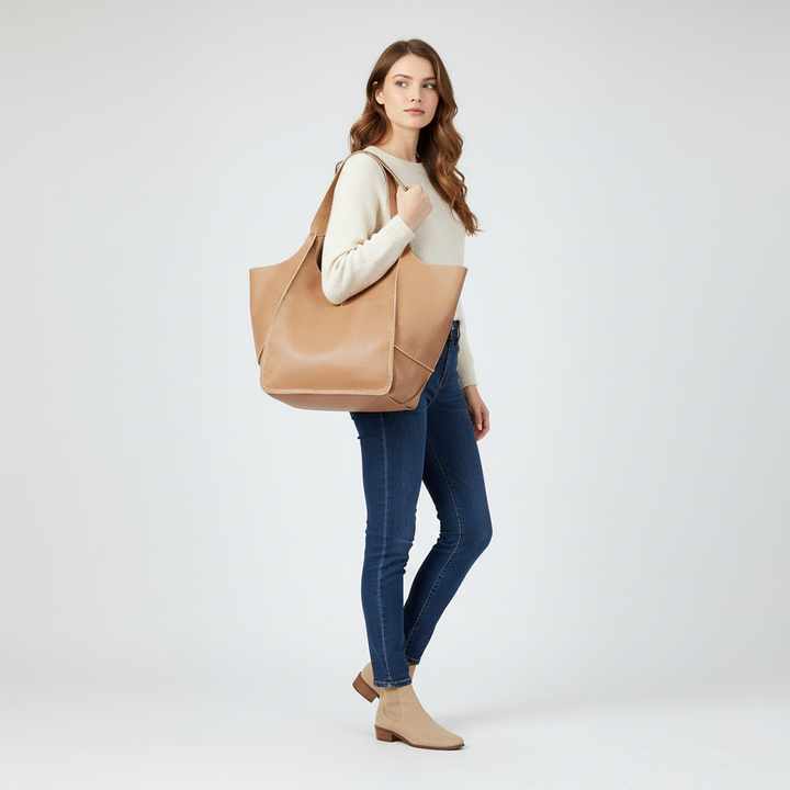 Elegant faux leather tote bag for women. Durable & large capacity, perfect for work or daily use.