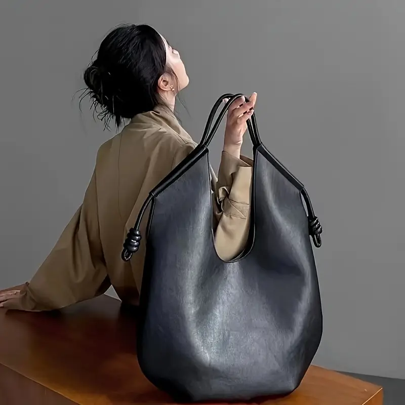 Chic minimalist women's shoulder bag, large capacity work or travel tote.