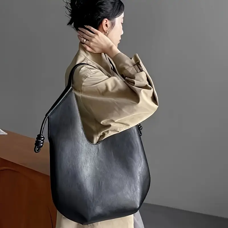 Stylish vegan leather everyday bag for women, a spacious and versatile carryall.