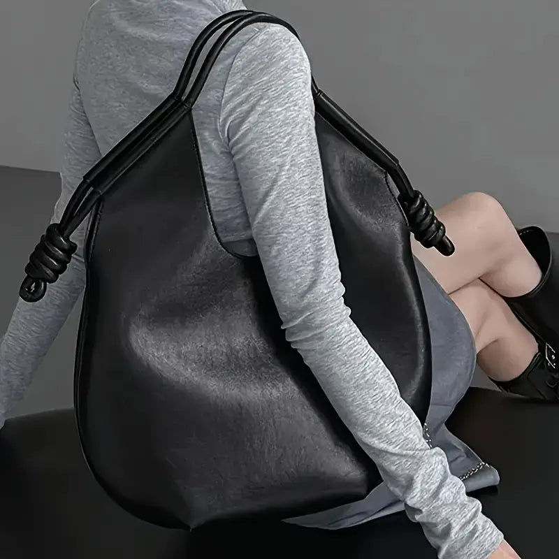 Versatile women's shoulder bag, large capacity vegan leather tote with minimalist design.