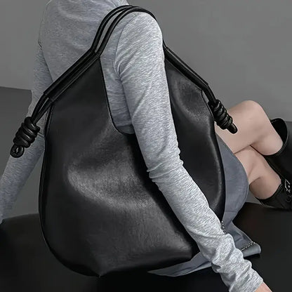 Versatile women's shoulder bag, large capacity vegan leather tote with minimalist design.