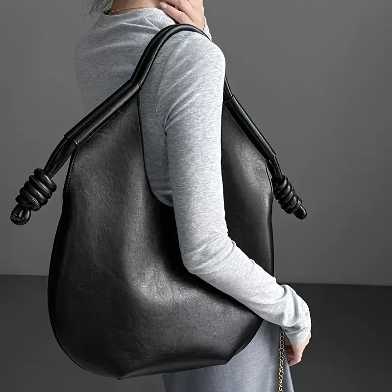 Durable vegan leather work bag for women, spacious and stylish everyday carryall tote.