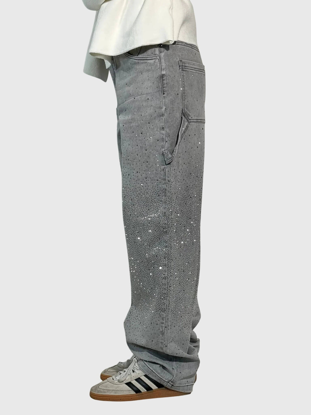 Full shot of women's sparkling diamond-detail loose fit pants, emphasizing relaxed comfort.