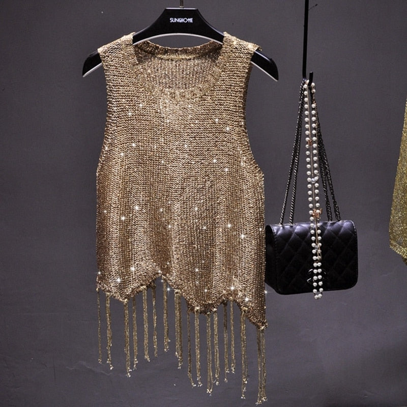 Women's sparkling glamour top, perfect for parties & evening wear. Chic sleeveless design for special occasions.