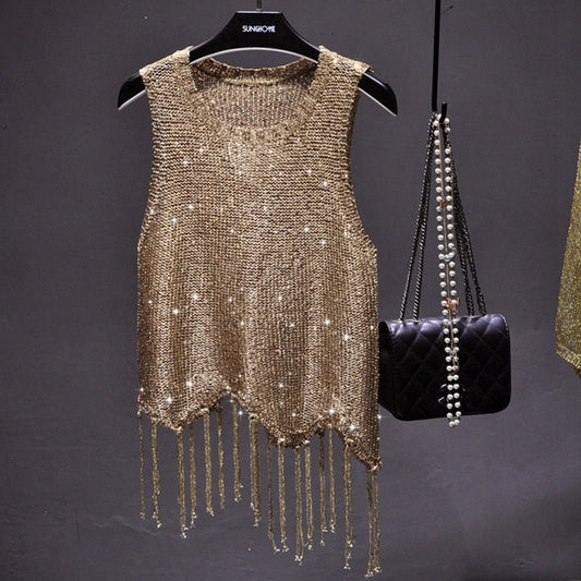 Women's sparkling glamour top, perfect for parties & evening wear. Chic sleeveless design for special occasions.
