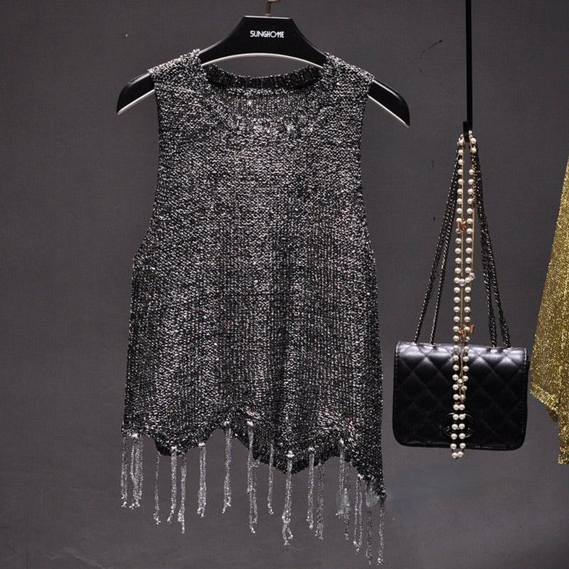 Chic women's sparkle top, a sleeveless fashion piece for glamorous evening wear & special occasions.