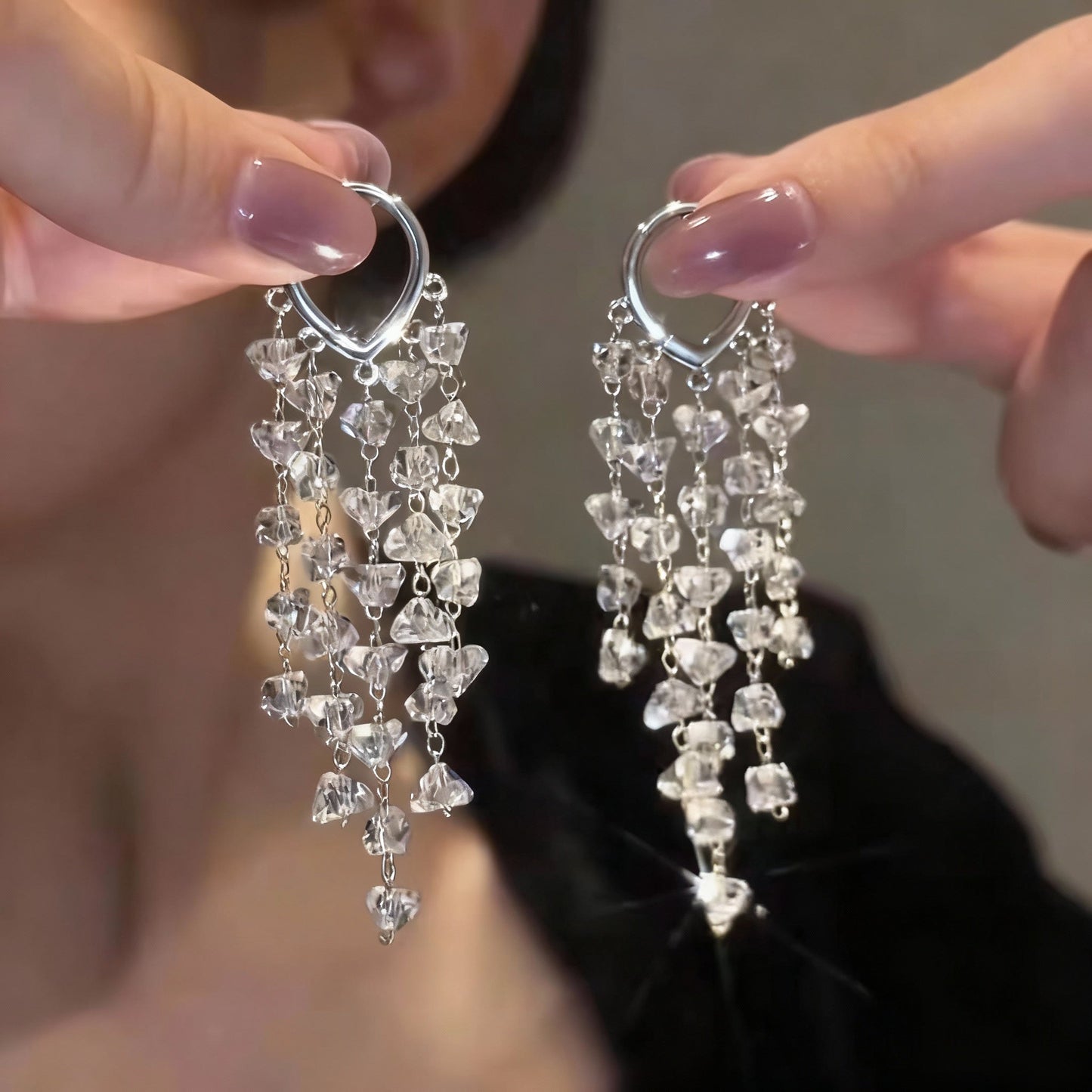 Long women's irregular crystal tassel earrings, sparkling and elegant, a stunning jewelry statement.