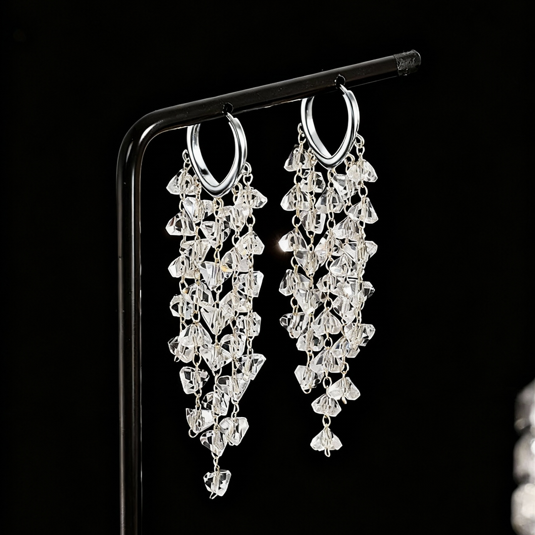 Exquisite women's sparkling irregular crystal tassel earrings, elegant and glamorous statement jewelry.