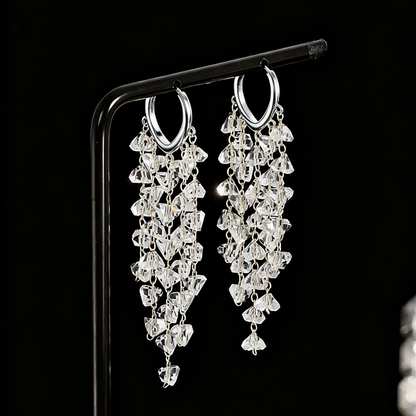 Exquisite women's sparkling irregular crystal tassel earrings, elegant and glamorous statement jewelry.