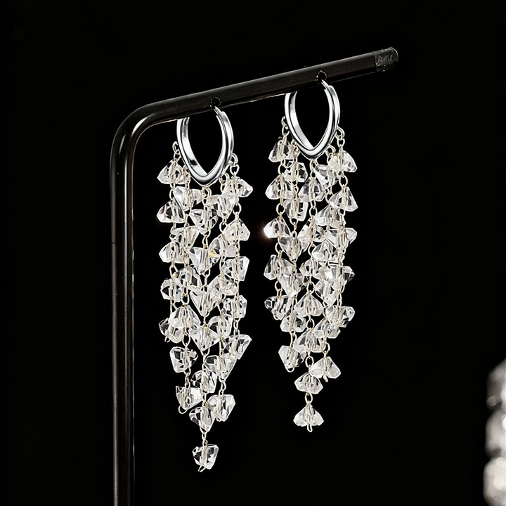 Exquisite women's sparkling irregular crystal tassel earrings, elegant and glamorous statement jewelry.
