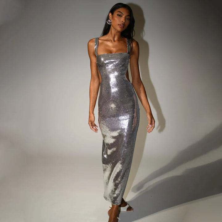 Elegant silver sparkling maxi dress for women, ideal as a formal gown or glamorous party dress.