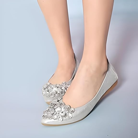 Comfortable women's slip-on ballerina flats with shimmering rhinestones for stylish glamour.